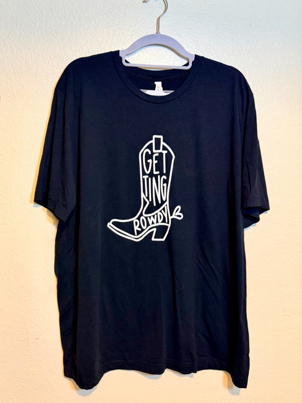 Black Graphic Tee with 'Getting Rowdy' Cowboy Boot Design